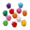 Pompones de hilo dorado de 2 cm.