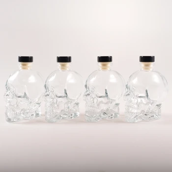 Unique shaped wine glass bottles clear 100ml skull bottle whiskey decorative glass bottle with cork stopper