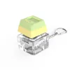 Clé unique colorée - verte et jaune
