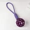Purple hollow ball with rope, approximately 97g, 40cm