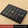 18 rectangular small black trays