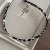 Base acetate hoop-black and white