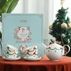1 teapot, 4 cups and saucers gift box (Happy Christmas)