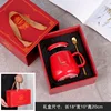 Red cup with spoon