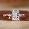 radiant side-stone ring