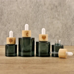 Custom round Bamboo Dropper for 15ml 30ml 50ml 1oz Skincare Facial Glass Serum Bottles for Skin Care and Eye Drops