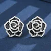 Pendientes de botón chapados en oro blanco