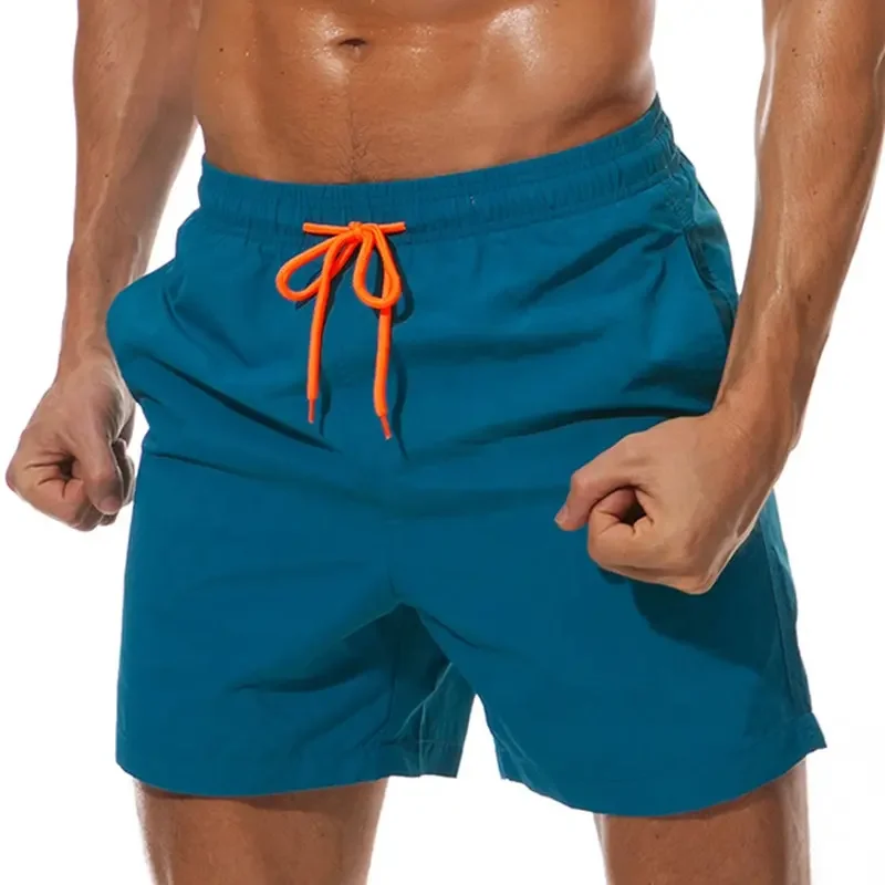 New 2023 apparel stock wholesale Summer Elastic Waist Mens Running 100% Polyester Solid color drawstring Swim Mesh Beach711_voghion.com