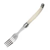 Single milk white handle fork