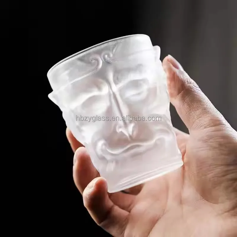 Manufacturers wholesale 110ml Transparent frosted Creative Monkey King shape glass cup factory