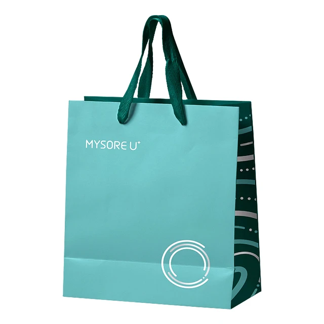 Customized cosmetic hand-held paper bags made of environmentally friendly materials and supermarket paper bags