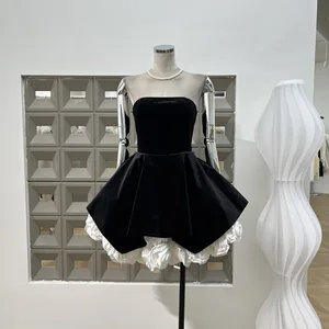 Elegant Black Velvet Short Party Dress with Floral Hem Detail Black Strapless Velvet Mini Dress with White Rose Petal Hem