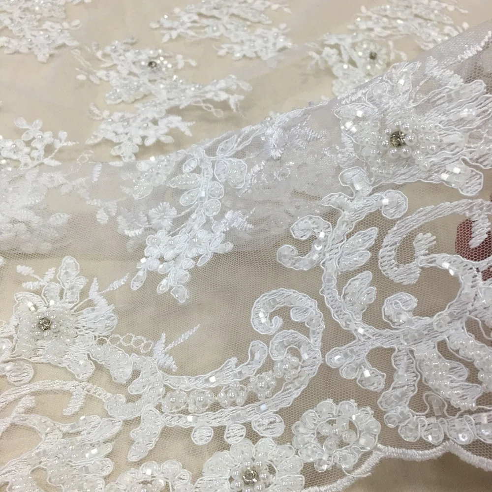 
Роскошная белая вышитая кружевная Тюлевая ткань для невесты с тяжелыми ручными бусинами и блестками кружевная ткань со стразами для свадебного платья 