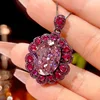 Black gold dried rose pendant with chain