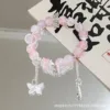 Piccola farfalla goccia d'acqua rosa