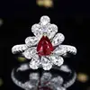 Anillo de diamantes con rubí natural