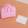 Pink bag + music sheet