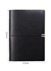Libro retro negro con correa.