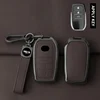 Porte-clés marron canon de fusil + cuir