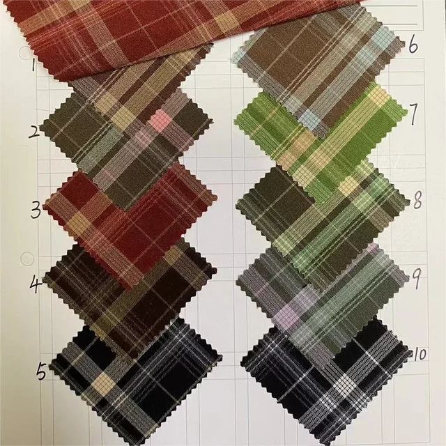 Jiexingtextile High Quality Polyester Yarn Dyed Woven Fabric Breathable Plain Shirting Fabric for Girls' Dresses Home Textiles