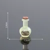 Bottiglia di pozione verde