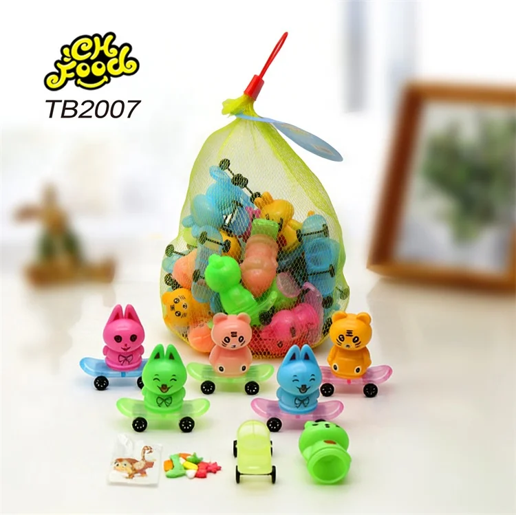 Wholesale and OEM Cartoon Animal Shape Scooter Toy with Fruit Flavor Tablet Candy and Tattoo for Kids