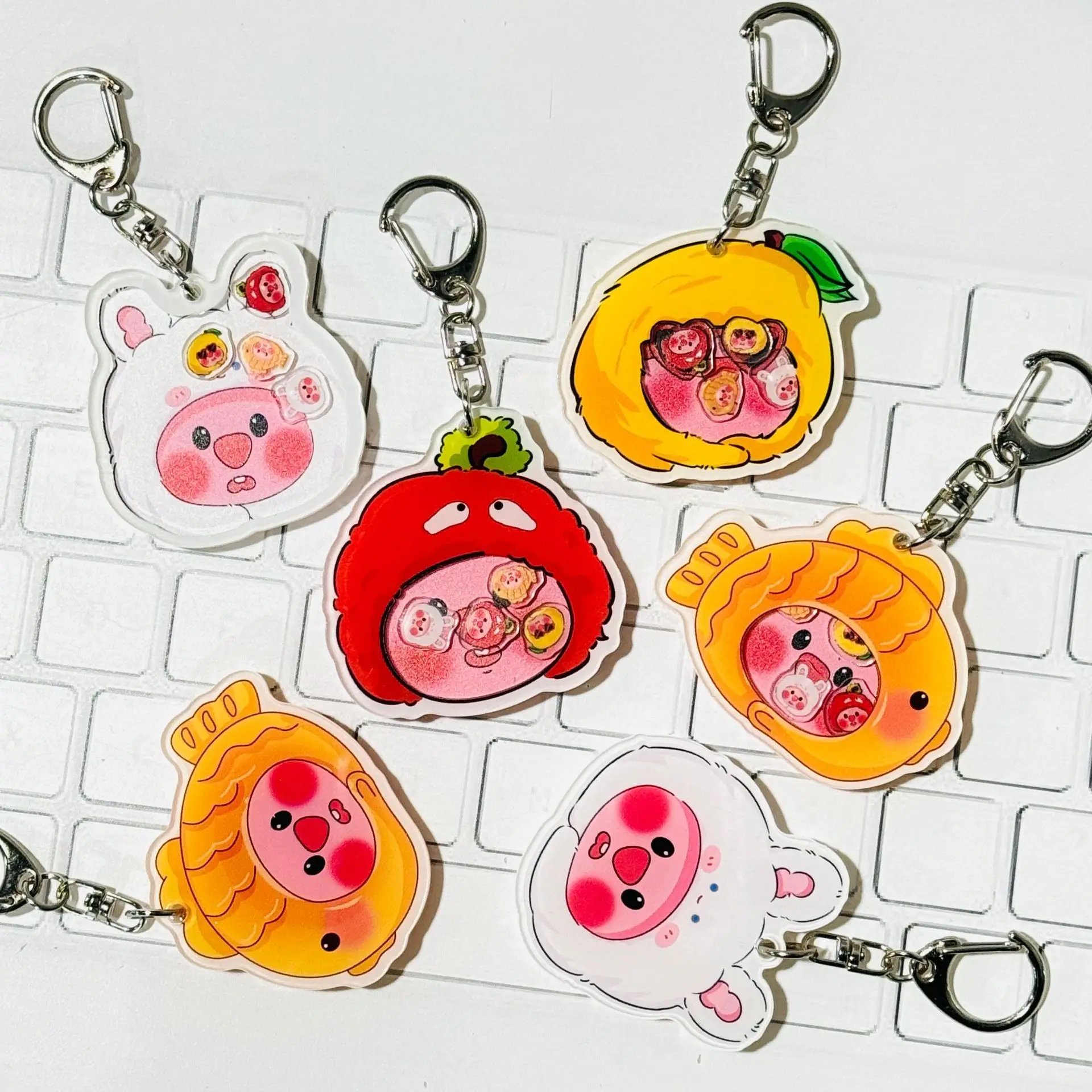 Popular design factory direct sales cartoon cute plastic shaker acrylic keychain custom details