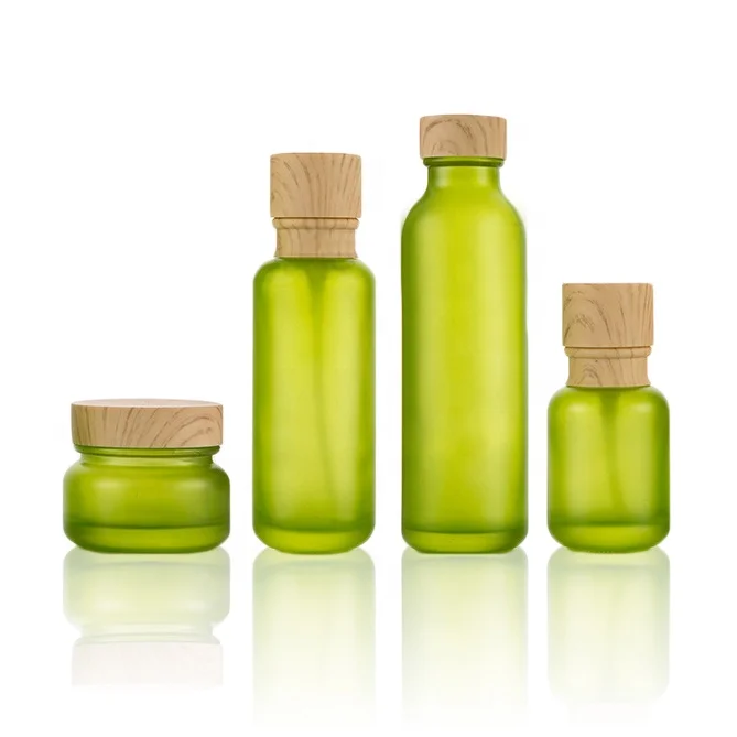 Download Smooth Curve Cute Cosmetic Packaging Green Glass Lotion Bottle And Jar 50ml Frosted Glass Bottle With Wooden Grain Cap Buy Green Glass Bottle Wooden Grain Cap Cute Bootle Product On Alibaba Com