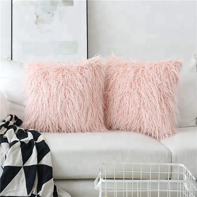 blush fur pillows