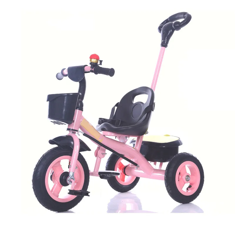 pink tricycle with handle