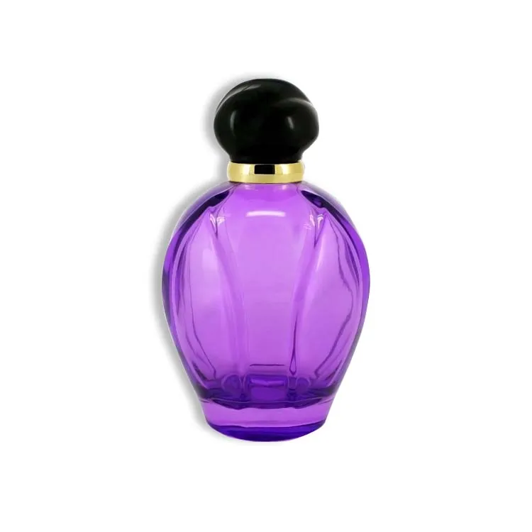 purple and black perfume bottle