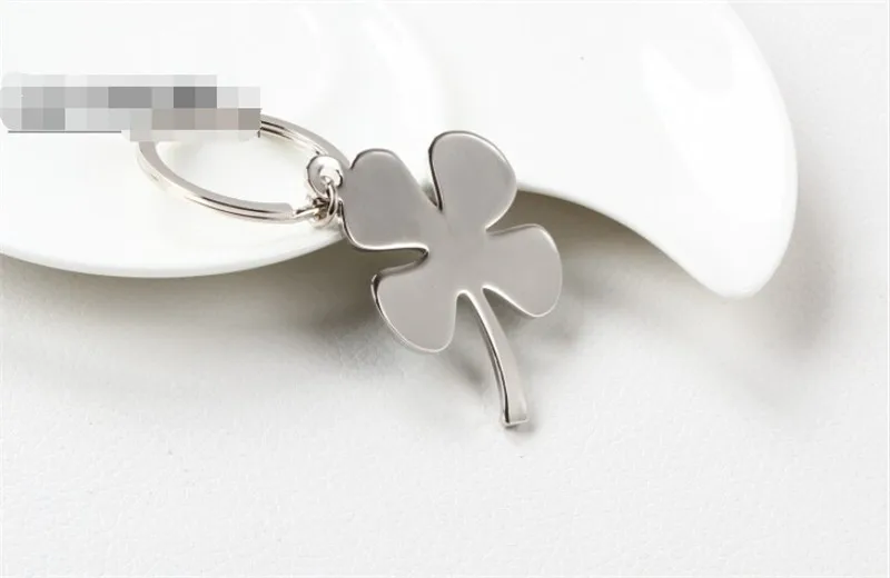 Stainless High Quality Green Leaf Keychain Fashion Creative Beautiful Four Leaf Clover Steel Lucky Key Chain Jewelry Keyring Buy Key Chains Metal Car Key Chain Product On Alibaba Com