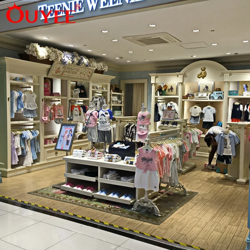 High End Fashion Wooden White Painting Children Kids Baby Clothes Store  Interior Design for Shop Display