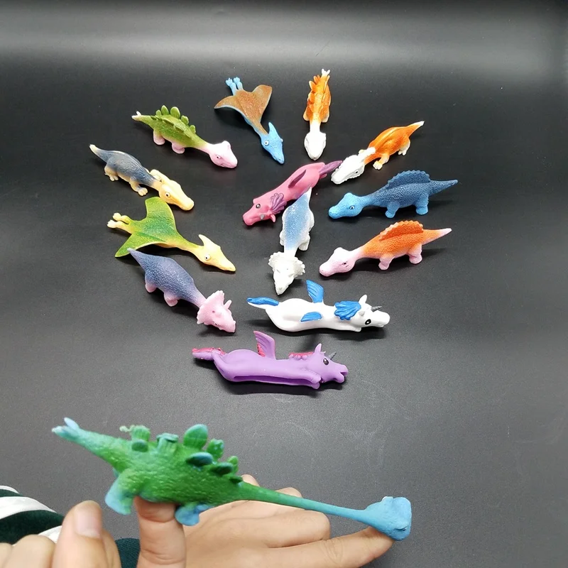 Source Jouet coloré pour enfant, jeu de rotation des doigts, tir de  dinosaure, fronde, 1 pièce, pour la Promotion, nouvelle collection on  m.alibaba.com