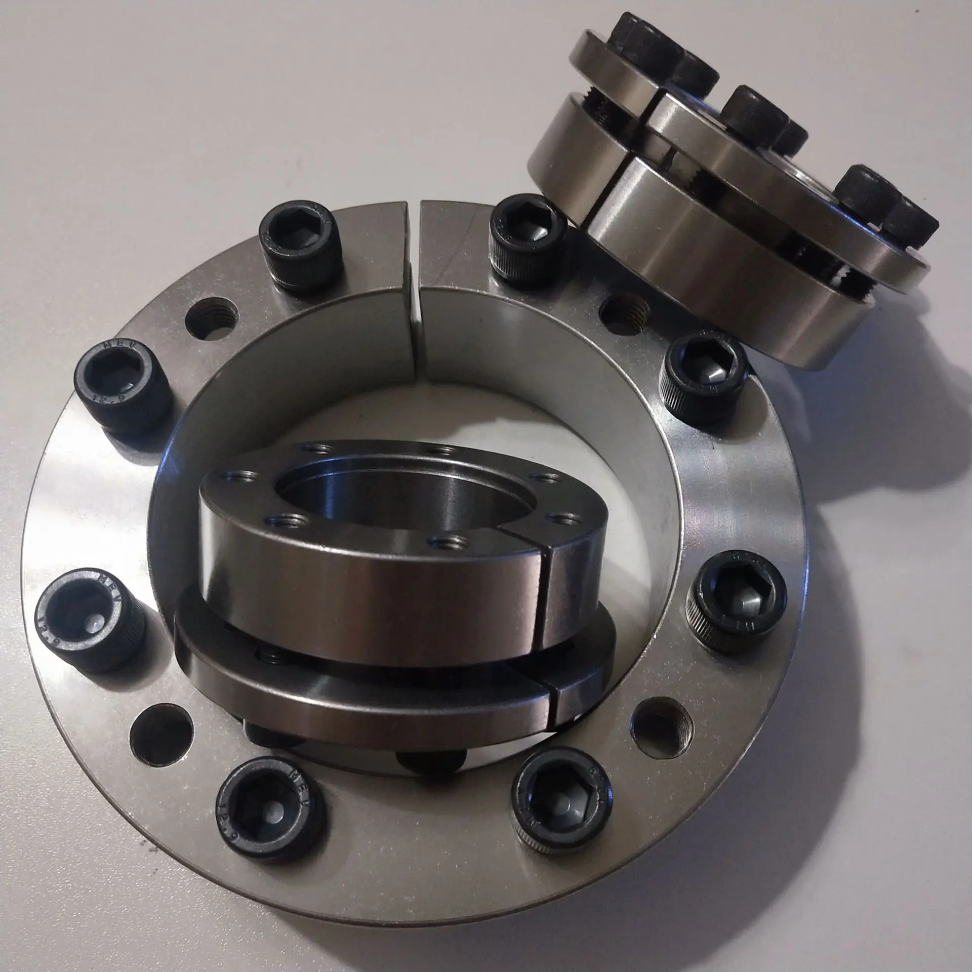 RLK200 Model RCK40 KTR100 SWLE200 Type Standard Shaft Power Locking Assembly for Industry Machinery Locking Device