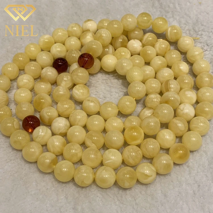 10-12mm Price of a gram natural white and yellow baltic amber stone loose ball beads necklace for sale