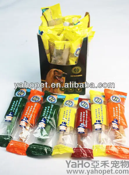 наёата собака зубной щеткой кости, собака закуски