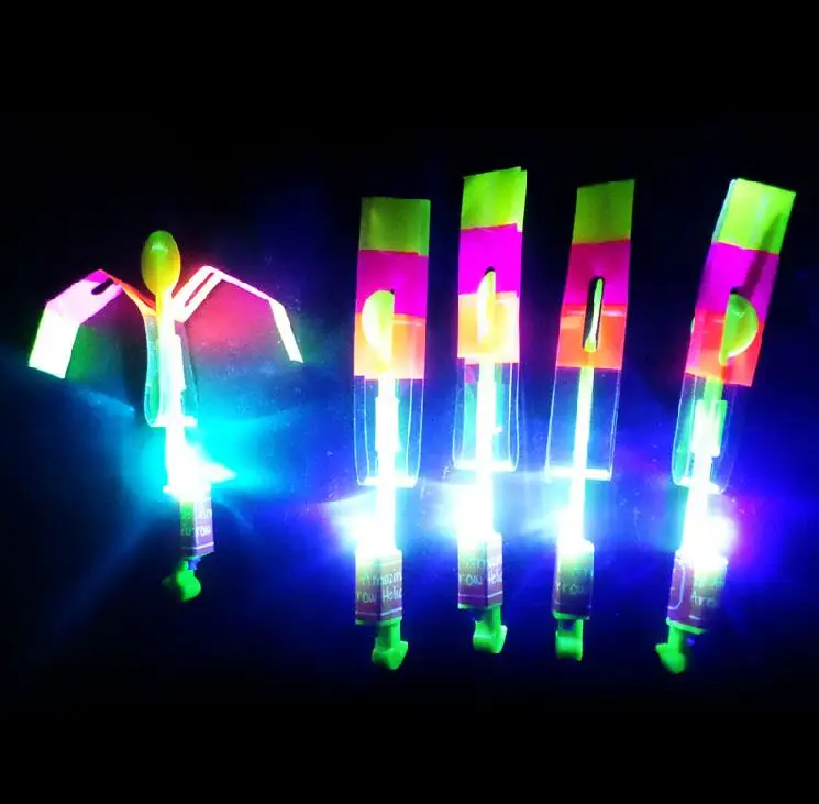 Set Of 12 Hot Kids Toys LED Glowing Flare Copter Flying Light Up Shotting Rocket 
