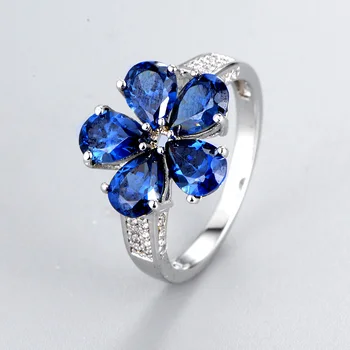 Flower shape emerald stone wedding ring design
