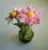 colored handmade crocheted flowers with clay pot