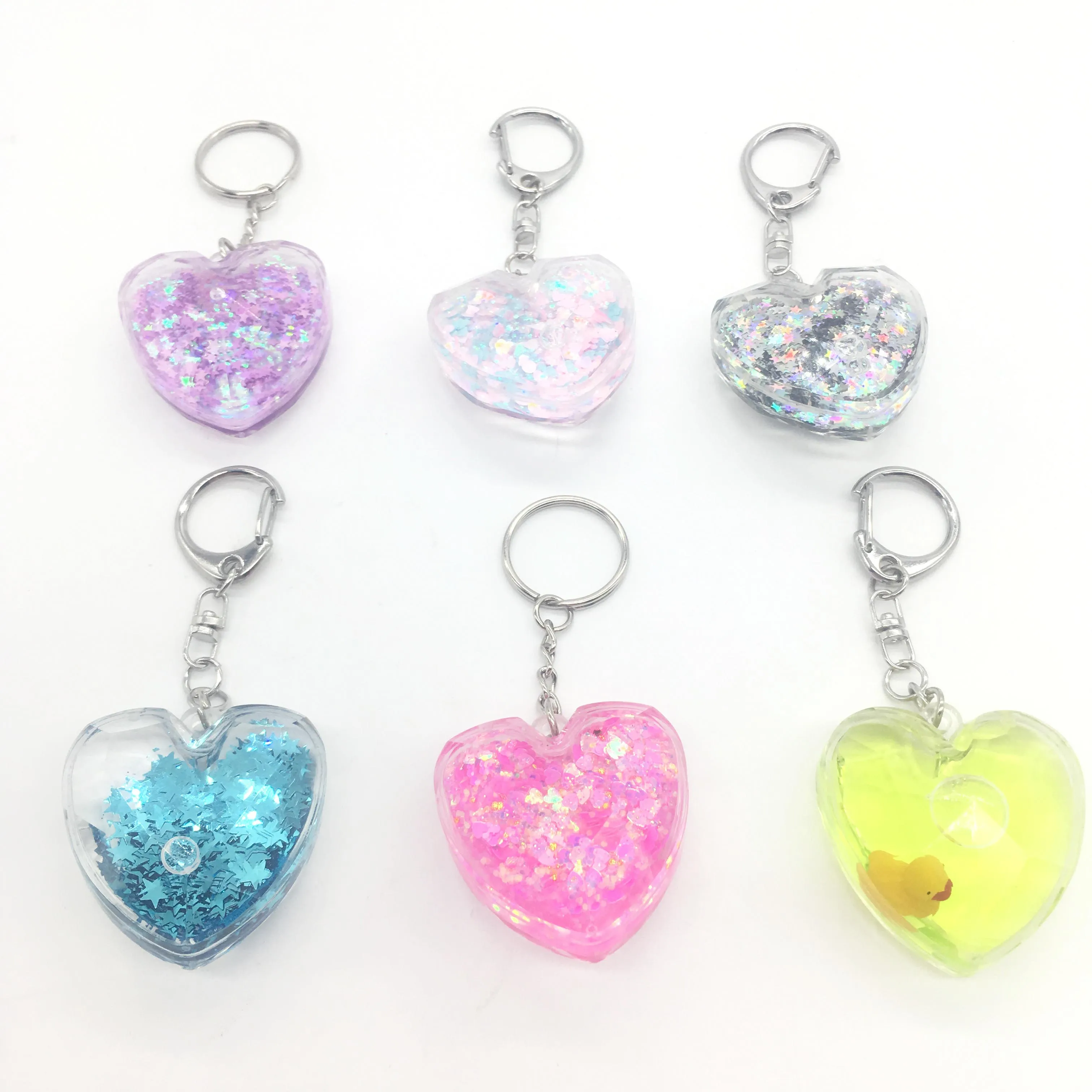 брелок с жидкостью внутри. брелок сердце 90е. брелок сердечко с жидкостью. брелки из акрила. брелок сердечко из 90-х.