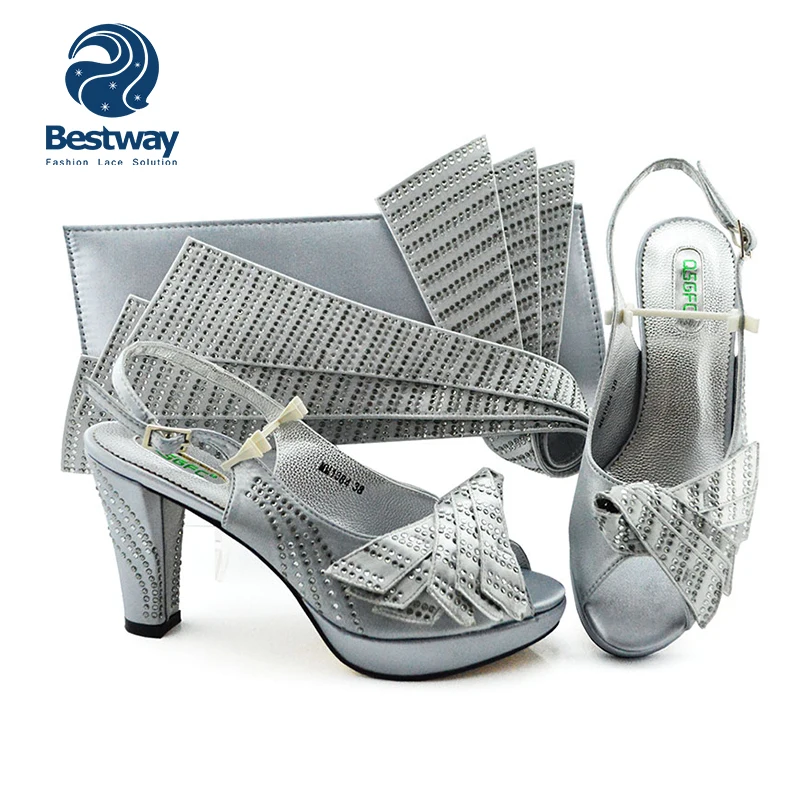 silver grey shoes and matching bolsa