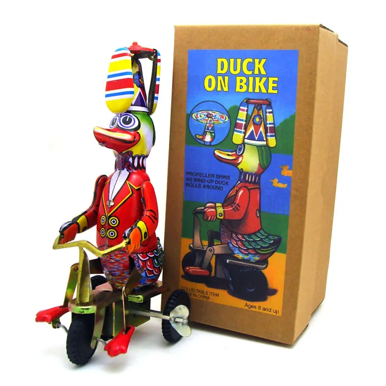 Promotional Gift Shooting Props Duck On Bike Tin Toy Wind Up