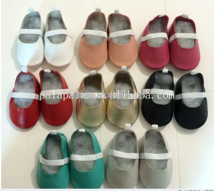 black and gold baby shoes