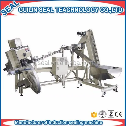 Машина для вставки пластиковых крышек бутылок, ватных уплотнений в крышки