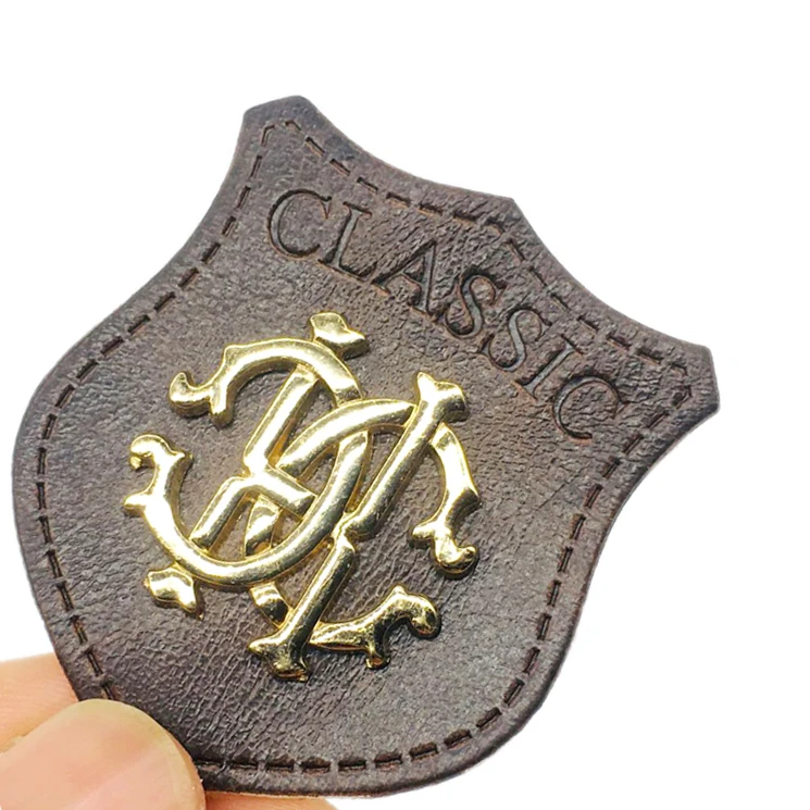 Source Stamping Sewing New Design Custom Made Fashion Brand Name Logo Metal  Label Patch for Jeans and Bag on m.