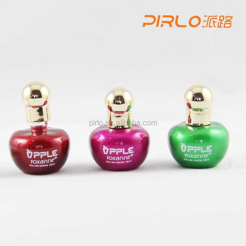 perfume in red apple shaped bottle