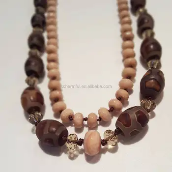 N00438 barrel shaped brown Tibetan DZI agate beads on braided blush leather necklace