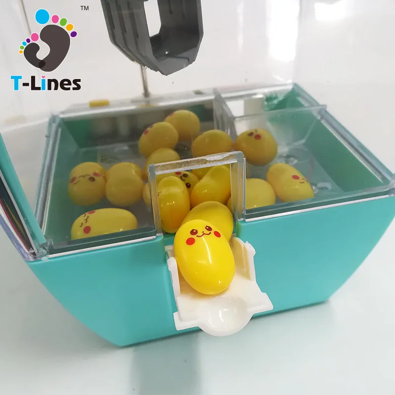 
 Мини-устройство захвата сладостей с функцией часов  