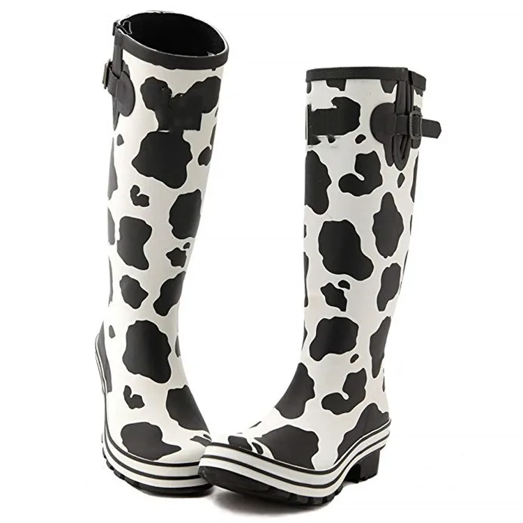 rain boots with cows on them